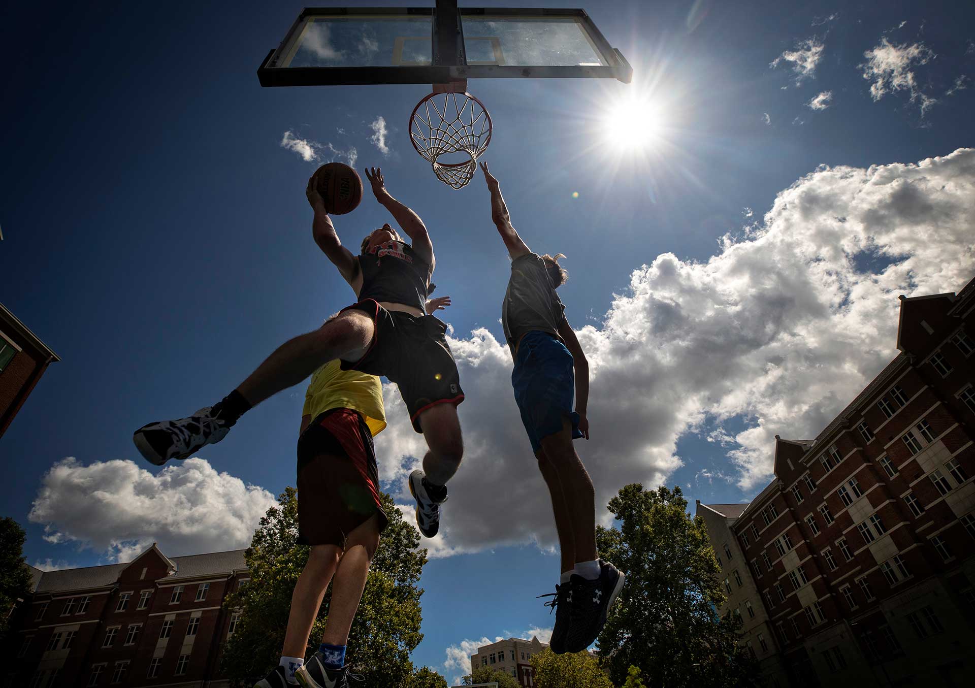 Students playing basketball 