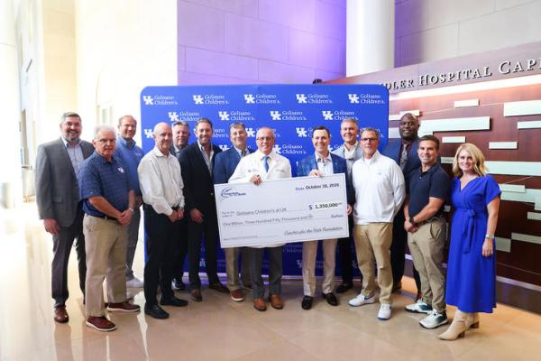 Image of Coaches for the kids check presentation
