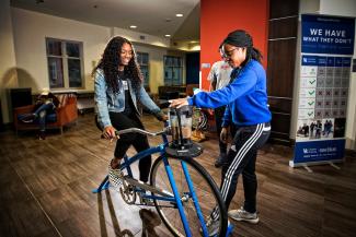 Students making a smoothie using a bike