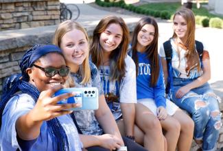 Students taking selfie