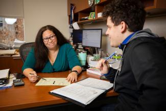 A student meets with an advisor.