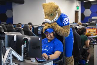 Student and Wildcat in Esports Lounge