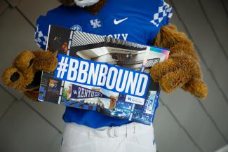 Wildcat holding BBN Bound sign