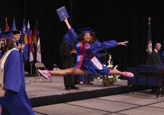 Student leaping at graduation