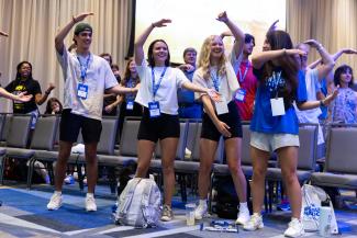 Students spelling CATS at orientation