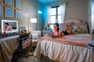 student in her dorm room