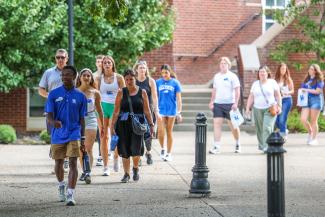 prospective students touring students
