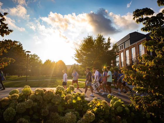 Photo of students walking on campus