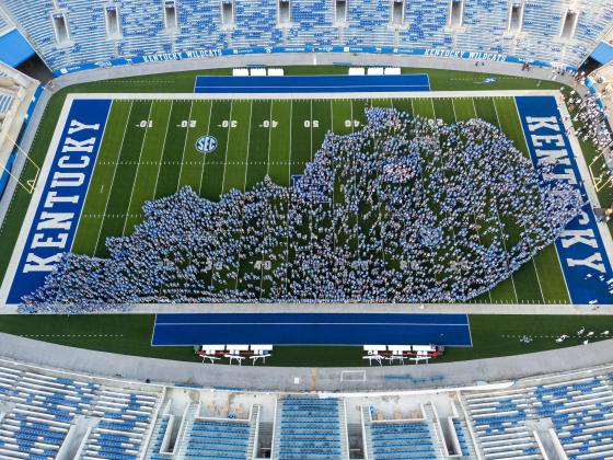 students in football stadium
